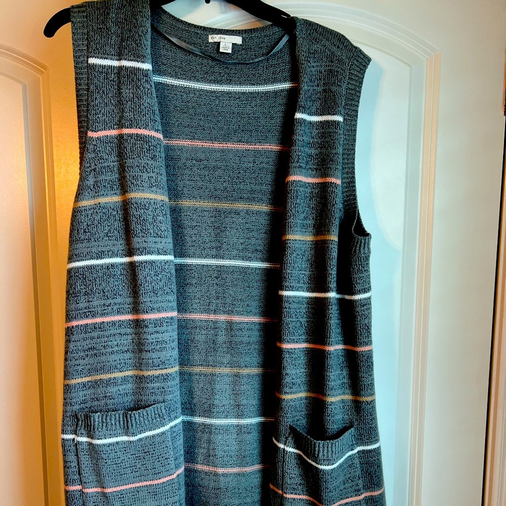 Cute sweater vest can be dressed up or down